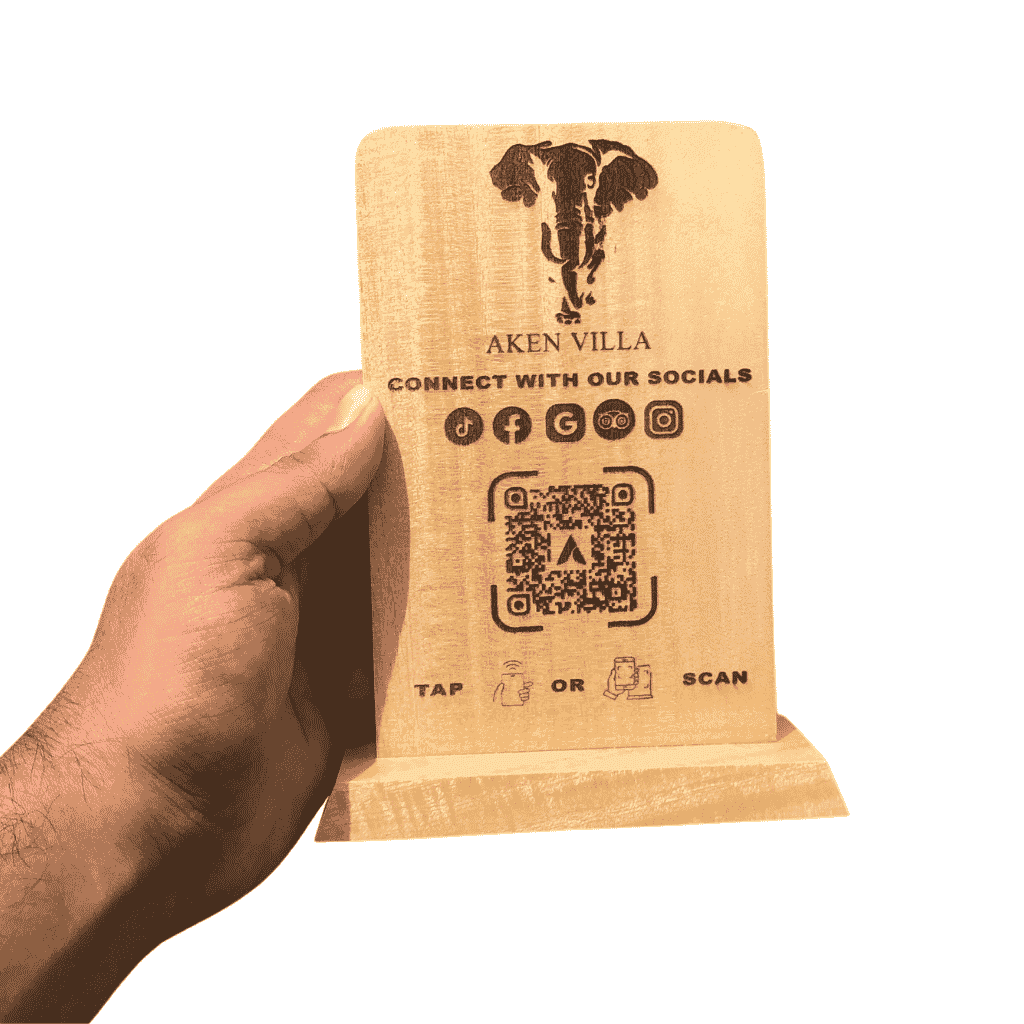 Wooden stand with NFC and QR code to grow your social media followers.